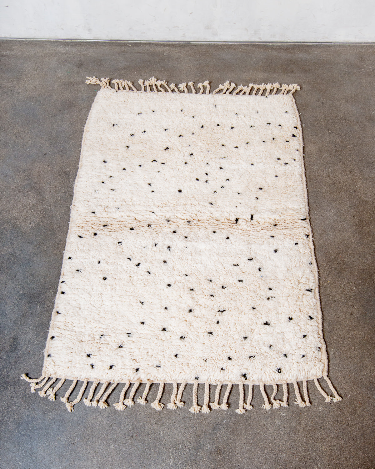 Modern, designer, handcrafted Berber rug from Morocco. Beniourain carpet with beautiful colours and patterns and fluffy wool texture.